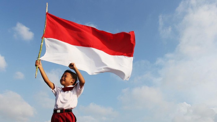 Ilustrasi Fakta Bahasa Indonesia Student with Indonesian flag