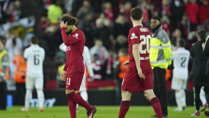 Liverpools Mohamed Salah gestures at the end of the Champions League, round of 16, first leg soccer match between Liverpool and Real Madrid at the Anfield stadium in Liverpool, England, Tuesday, Feb. 21, 2023. (AP Photo/Jon Super)