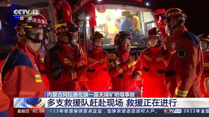 In this image taken from video footage run by China's CCTV, rescuers gather at the site of a mine collapse in Alxa League in northern China's Inner Mongolia, Wednesday, Feb. 22, 2023. An open pit mine collapsed in China's northern Inner Mongolia region on Wednesday, killing several people and leaving dozens missing, state media reported. (CCTV via AP)