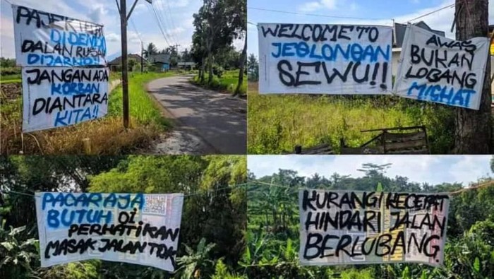 Warga protes jalan rusak dengan memasang sejumlah spanduk.
