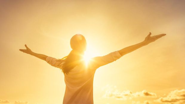 Woman feeling full of positive energy.