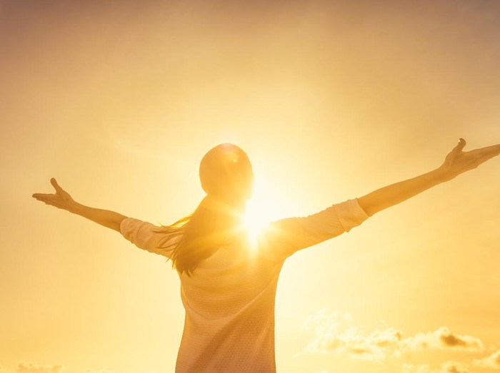 Woman feeling full of positive energy.