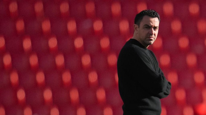 ALMERIA, SPAIN - FEBRUARY 26: Xavi Hernandez, head coach of FC Barcelona looks the pitch prior to the LaLiga Santander match between UD Almeria and FC Barcelona at Juegos Mediterraneos on February 26, 2023 in Almeria, Spain. (Photo by Aitor Alcalde Colomer/Getty Images)