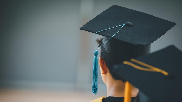 The back of the graduates are walking to attend the graduation ceremony at the university,Concept of Successful Education in Hight School,Congratulated Degree