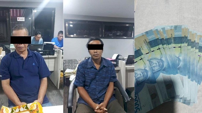 Dua pelaku pembuat dan pengedar uang palsu di Surabaya saat ditangkap
