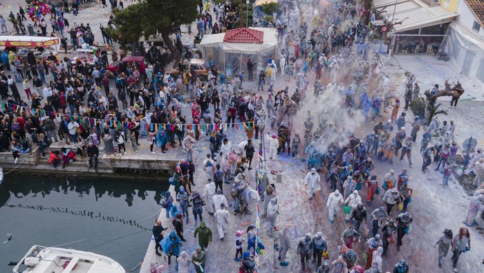 GALAXIDI, GREECE - MARCH 14:  Local revelers celebrate Clean Monday with a colorful flour-war, traditionally marking the end of the carnival season on March 14, 2005 in Galaxidi, Greece. Clean Monday symbolizes the climax of the carnival and the start of 40-days lent before Easter.  (Photo by Milos Bicanski/Getty Images)