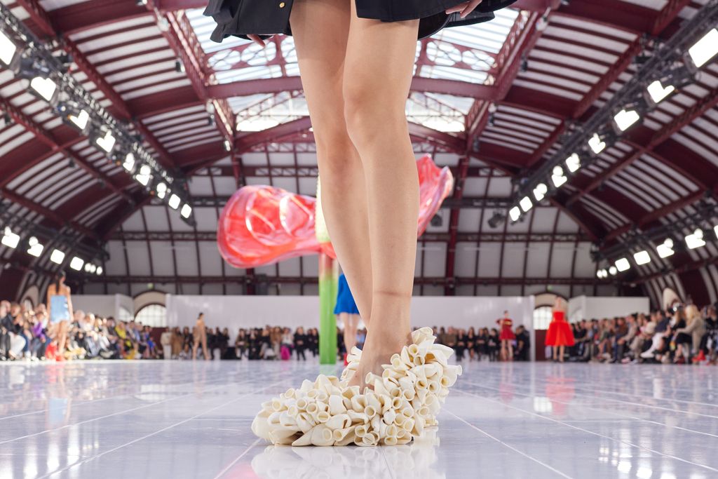 PARIS, FRANCE - SEPTEMBER 30: (EDITORIAL USE ONLY - For Non-Editorial use please seek approval from Fashion House) A model, shoe detail, walks the runway during the Loewe Womenswear Spring/Summer 2023 show as part of Paris Fashion Week on September 30, 2022 in Paris, France. (Photo by Peter White/Getty Images)
