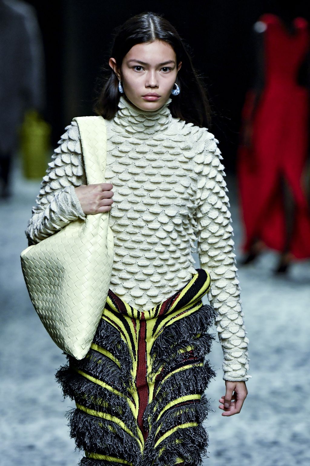 MILAN, ITALY - FEBRUARY 25: A model walks the runway during the Bottega Veneta Ready to Wear Fall/Winter 2023-2024 fashion show as part of the Milan Fashion Week on February 25, 2023 in Milan, Italy. (Photo by Victor VIRGILE/Gamma-Rapho via Getty Images)