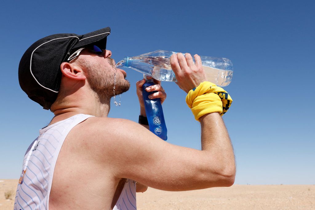 Runners of the XXIII edition of the Sahara Marathon are pictured at the starting point in the Auserd Sahrawi refugee camp, in Tindouf, Algeria, February 28, 2023. REUTERS/Borja Suarez