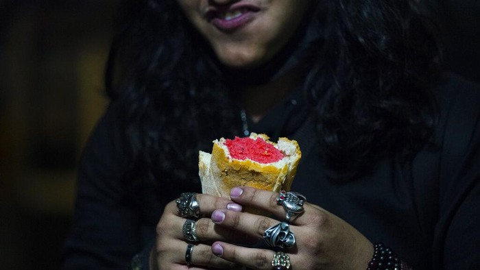 Workers make tamales for the 