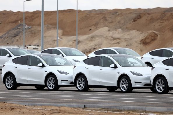 Tesla Model Y electric vehicles in a lot at the Tesla Inc. Gigafactory in Gruenheide, Germany, on Saturday, Jan. 21, 2023. Tesla CEO Elon Musk played down how much impact his tweets have on the company's stock price as he defended himself at a trial in San Francisco federal court on Friday over his 2018 tweet about taking the electric car-maker private. Photographer: Liesa Johannssen/Bloomberg via Getty Images