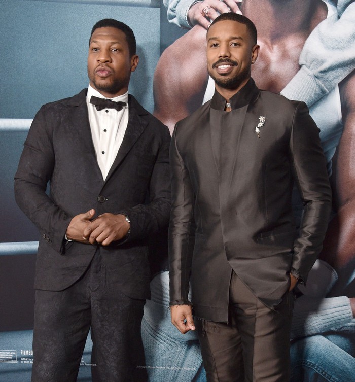 1470172828 HOLLYWOOD, CALIFORNIA - FEBRUARY 27: Jonathan Majors and Michael B. Jordan attend the Los Angeles Premiere Of