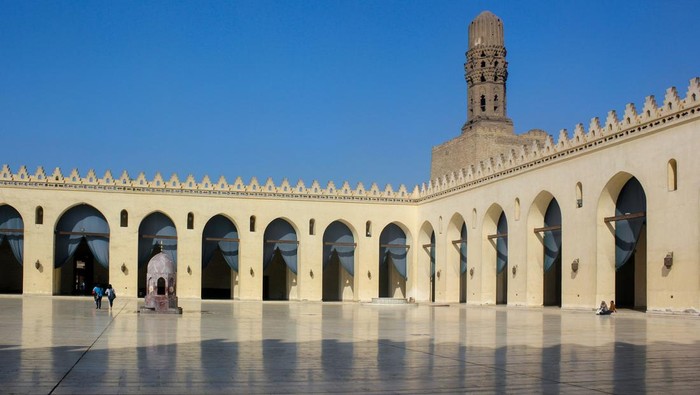 Minaret of public historic Al Hakim Mosque known as The Enlightened Mosque, located in Moez Street