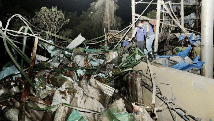 Firefighters inspect the site of an explosion at an oxygen plant on the outskirts of Chittagong on March 4, 2023. - At least five people were killed and dozens were injured in an explosion at an oxygen plant outside Bangladesh's port city of Chittagong on March 4, officials said. (Photo by AFP) (Photo by -/AFP via Getty Images)