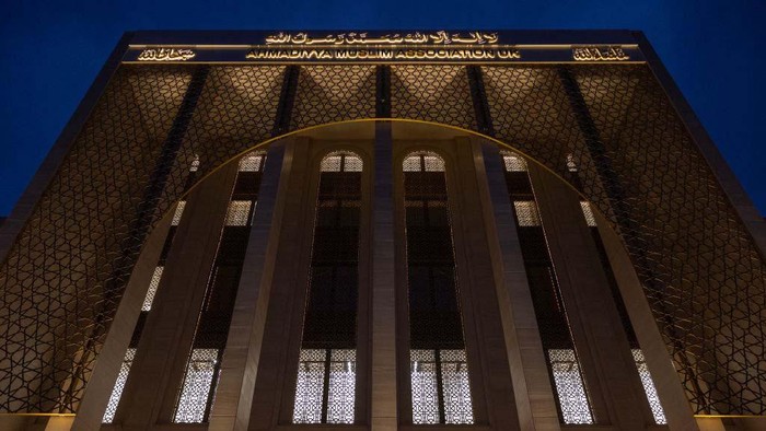 LONDON, ENGLAND - MARCH 04: Men observe prayer at the Baitul Futuh Mosque on March 04, 2023 in London, England. Parts of the mosque have undergone a £20 million pound refurbishment after a large fire destroyed a third of the complex in 2015. The mosque, home to the Ahmadiyya Muslim Community, is one of Western Europe's largest and can accommodate up to 10,000 worshippers. The new facility incorporates low energy and sustainable technologies including, solar panels, efficient heating and cooling systems, and other energy and water saving features which contribute towards its green footprint. (Photo by Dan Kitwood/Getty Images)