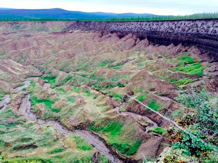 Kawah Batagaika Kawah Batagaika di Siberia terus melebar.