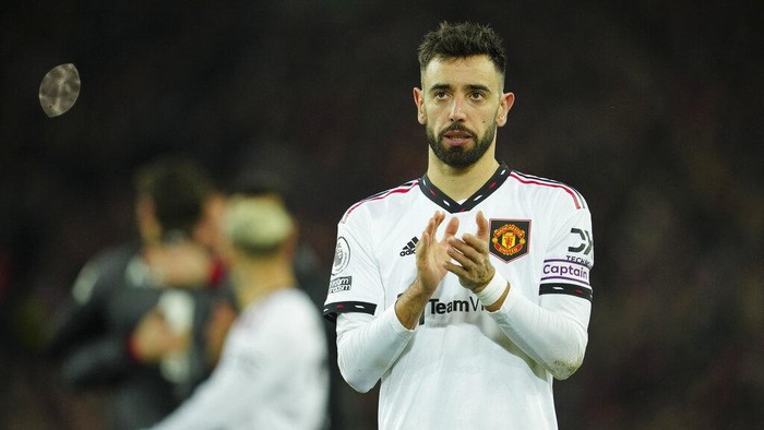Manchester Uniteds Bruno Fernandes reacts after the the English Premier League soccer match between Liverpool and Manchester United at Anfield in Liverpool, England, Sunday, March 5, 2023. Liverpool won the match 7-0. (AP Photo/Jon Super)