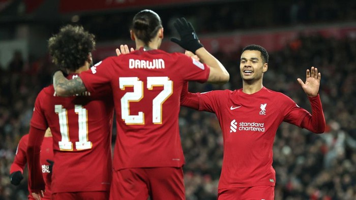 LIVERPOOL, ENGLAND - JANUARY 07: Mohamed Salah of Liverpool celebrates with teammates Darwin Nunez and Cody Gakpo after scoring the teams second goal during the Emirates FA Cup Third Round match between Liverpool FC and Wolverhampton Wanderers at Anfield on January 07, 2023 in Liverpool, England. (Photo by Naomi Baker/Getty Images)
