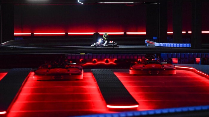A man drives a go-kart during the inauguration of Foodkart Caracas, the first indoor kart track in Caracas, Venezuela, Saturday, March 4, 2023. (AP Photo/Matias Delacroix)