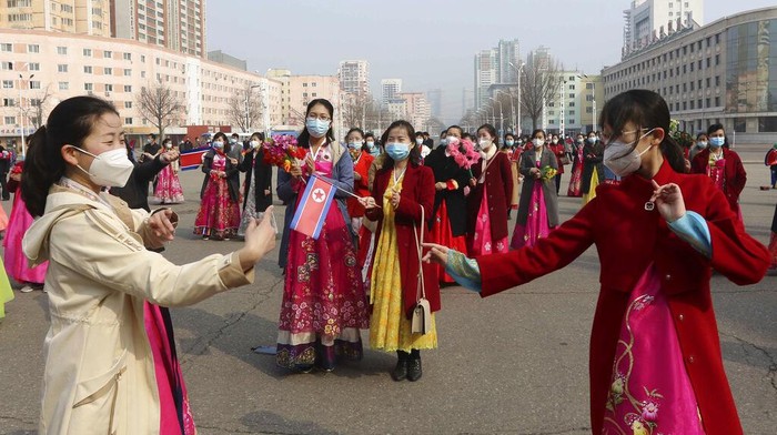 North Korean people celebrate International Womens Day in Pyongyang, North Korea, Wednesday, March 8, 2023. (AP Photo/Jon Chol Jin)