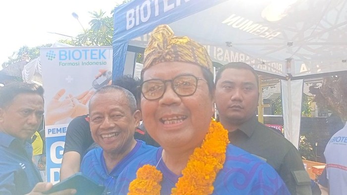 Ketua Mahkamah Agung (MA) Muhammad Syarifuddin saat hadir di acara Walking and Giving IKA UII di Banjar Segara Kuta, Kecamatan Kuta, Badung, Bali, Jumat (10/3/2023). (Agus Eka)