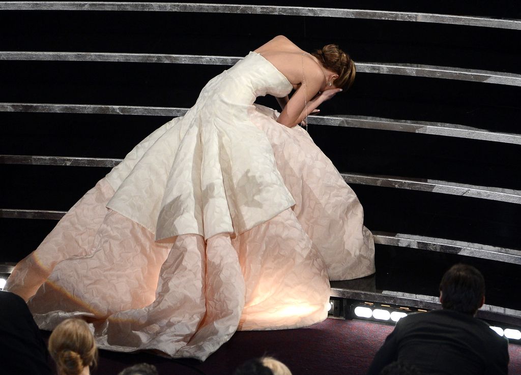 HOLLYWOOD, CA - FEBRUARY 24:  Actress Jennifer Lawrence reacts after winning the Best Actress award for 