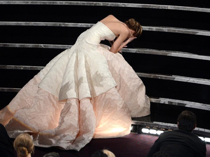 HOLLYWOOD, CA - FEBRUARY 24:  Actress Jennifer Lawrence reacts after winning the Best Actress award for 