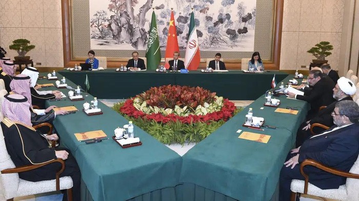 In this photo released by Xinhua News Agency, Wang Yi, Chinas most senior diplomat, center, presides over a closed meeting between Iran, led by Ali Shamkhani, the secretary of Irans Supreme National Security Council, at right, and Saudi Arabia, led by Saudi national security adviser Musaad bin Mohammed al-Aiban, at left, in Beijing, Saturday, March 11, 2023. Iran and Saudi Arabia agreed Friday to reestablish diplomatic relations and reopen embassies after seven years of tensions. The major diplomatic breakthrough negotiated with China lowers the chance of armed conflict between the Mideast rivals, both directly and in proxy conflicts around the region. (Luo Xiaoguang/Xinhua via AP)