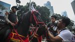 Saat Polisi Berkuda Jadi Primadona di CFD Jakarta
