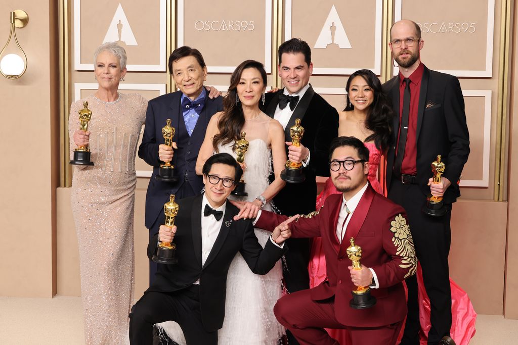 HOLLYWOOD, CALIFORNIA - MARCH 12: Jamie Lee Curtis, James Hong, Ke Huy Quan, Michelle Yeoh, Jonathan Wang, Daniel Kwan, Stephanie Hsu, and Daniel Scheinert, winners of the Best Picture award for 'Everything Everywhere All at Once', pose in the press room during the 95th Annual Academy Awards at Ovation Hollywood on March 12, 2023 in Hollywood, California. (Photo by Rodin Eckenroth/Getty Images)
