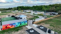 Pandangan udara dari komunitas Snailbrook Elon Musk yang sedang dibangun di Bastrop County, Texas, Senin (13/3/2023).   