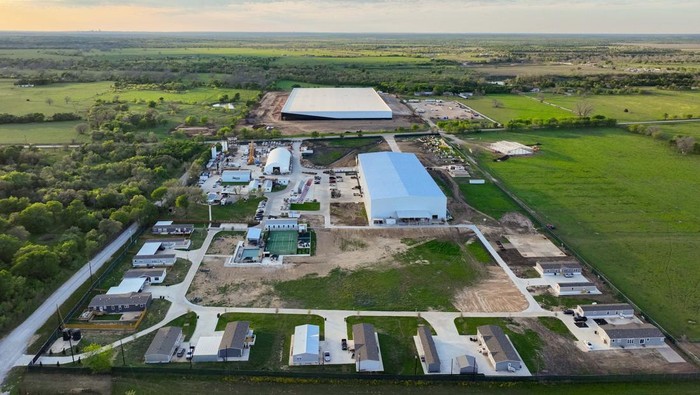 BASTROP COUNTY, TEXAS - MARCH 13: An aerial view of Elon Musk's Snailbrook community under construction on March 13, 2023 in Bastrop County, Texas. Elon Musk has reportedly bought thousands of acres of land in a plan to build a town where employees could live and work. (Photo by Brandon Bell/Getty Images)