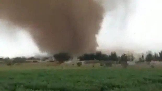 Videos circulating on social media showed the moment the tornado moved across a field. (Screengrab: Twitter)