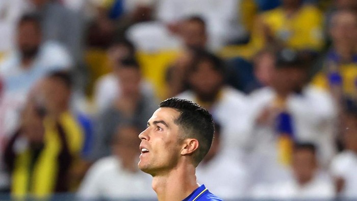 Nassrs Portuguese forward Cristiano Ronaldo reacts during the King Cup quarter-final football match between al-Nassr and Abha at Mrsool Park Stadium in Riyadh on March 14, 2023. (Photo by Fayez NURELDINE / AFP)