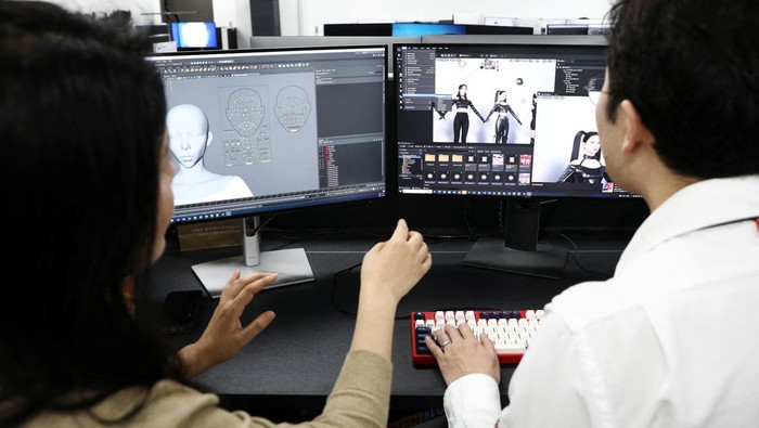 Mengenal MAVE, Girlband Metaverse Pertama dari Korea Selatan Footages of virtual girl group MAVE is played at the control room of MBC in Seoul, South Korea, February 28, 2023. REUTERS/Kim Soo-hyeon