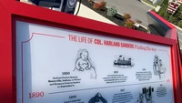 Papan ini menunjukkan perjalanan hidup Colonel Harland Sander. Ia diketahui menciptakan resep fried chicken saat tempat itu masih berupa pom bensin sekitar tahun 1930.