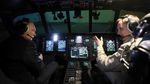 Gaya Putin Jadi Pilot di Pabrik Helikopter Rusia