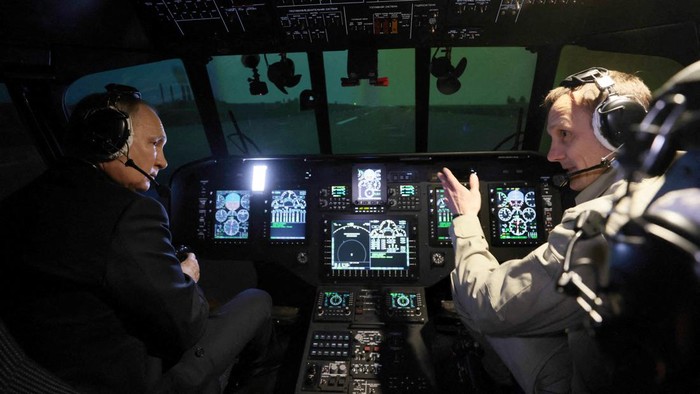 Russian President Vladimir Putin is seen inside a cabin of helicopter simulator training as he visits aviation plant in Ulan-Ude, Buryatia republic, Russia March 14, 2023.  Sputnik/Mikhail Metzel/Pool via REUTERS ATTENTION EDITORS - THIS IMAGE WAS PROVIDED BY A THIRD PARTY.     TPX IMAGES OF THE DAY