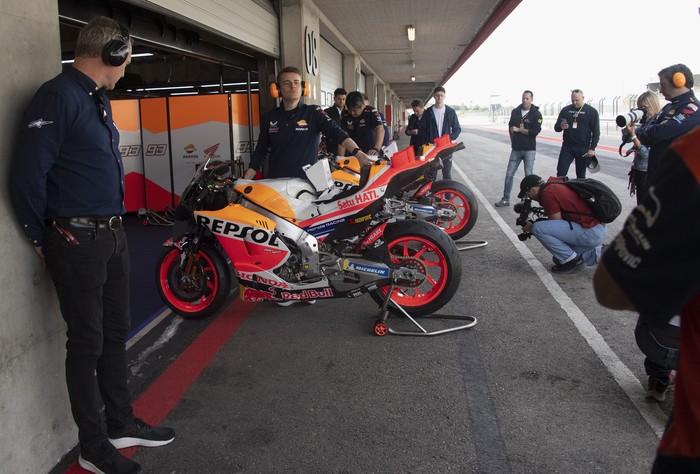 PORTIMAO, PORTUGAL - MARCH 12: The mechanics at work on the bikes of Marc Marquez of Spain and Repsol Honda Team in pit during the Portimao MotoGP Official Test at Portimao Circuit on March 12, 2023 in Portimao, Portugal. (Photo by Mirco Lazzari gp/Getty Images)