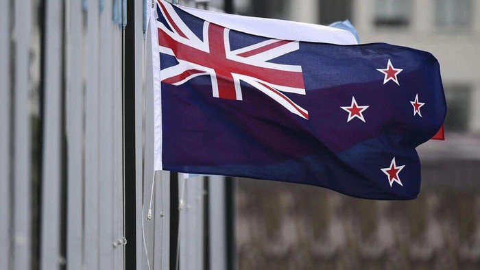 The New Zealand flag flutters outside Parliament buildings in Wellington in Wellington on October 29, 2014. © Marty Melville, AFP