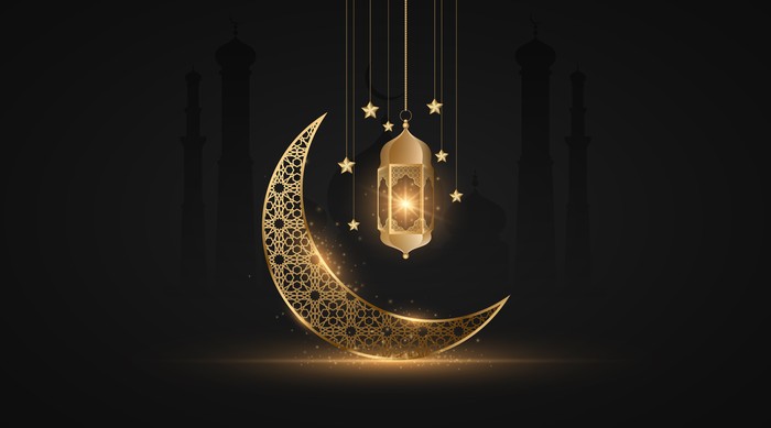 Ramadan Kareem month with glowing lantern on the background of the old city with mosque. Abstract golden moon with islamic ornament. Eid Mubarak. Holy month for fasting Muslims. Vector