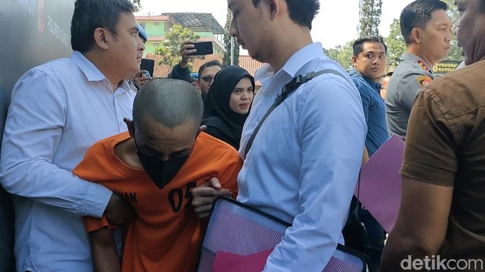 Pelaku pemukulan di Garut.