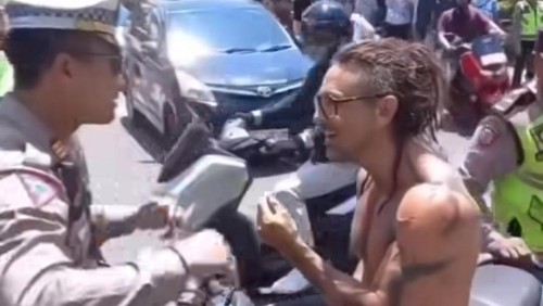 Tangkapan layar bule AS, Bryan mendebat Kasatlantas Polres Gianyar AKP Muhammad Bhayangkara Putra Sejati, Rabu (15/3/2023).