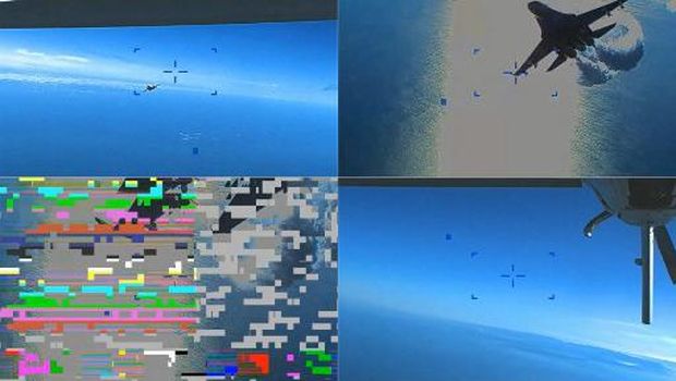 (COMBO) This combination of handout images taken from video released by U.S. European Command (USEUCOM) on March 16, 2023, shows onboard footage from a U.S. Air Force MQ-9 drone as it is approached by a Russian SU-27 aircraft (TOP/L), as the Russian SU-27 aircraft jettissons fuel while approaching the drone (TOP R), at the moment of the collision of the drone with a Russian SU-27 aircraft  (BOTTOM/L), and the drone with a damaged propellor following a collision with the Russian SU-27 aircraft (BOTTOM/R), over The Black Sea on March 14, 2023. - Moscow said that it would try to retrieve the wreckage of a US military drone that crashed over the Black Sea in a confrontation Washington blamed on two Russian fighter jets. Russia also warned that it would react 