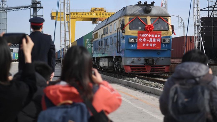 BEIJING, CHINA - MARCH 16: A China-Europe freight train loaded with 55 containers of goods sets out from Mafang railway station on March 16, 2023 in Beijing, China. The freight train left Beijing today bound for Moscow, marking the launch of the first direct China-Europe freight train service from Beijing. (Photo by Wei Tong/Beijing Youth Daily/VCG via Getty Images)