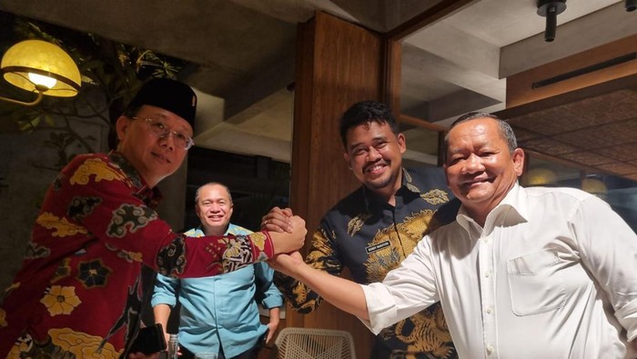 Salam Komando Bobby Nasution dan Ketua DPRD Medan, Hasyim. (Foto: Istimwewa)