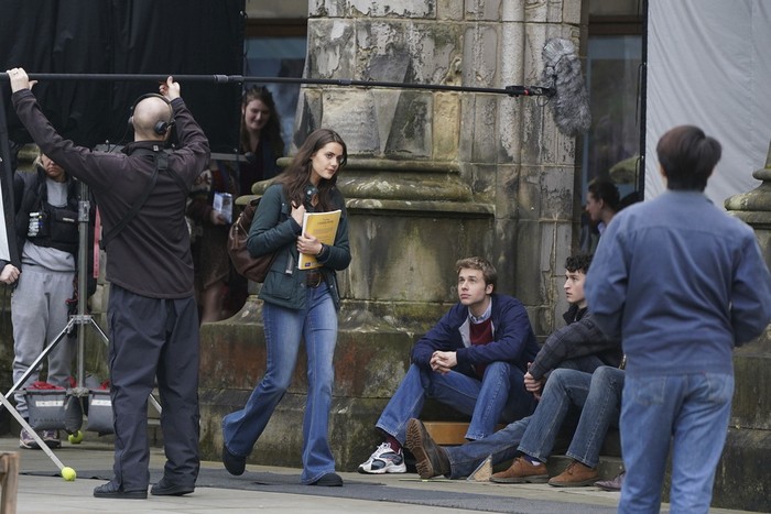 Actress Meg Bellamy, who plays Kate Middleton, and actor Ed McVey, who plays the part of Prince William, film scenes for the next season of The Crown, in St Andrews, Scotland, Friday March 17, 2023. (Andrew Milligan/PA via AP)