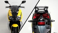 Desain dari VADV150 sudah jelas menjadi tren skutik bongsor bergaya adventure kebanyakan saat ini. Seperti penggunaan setang lebar, berbobot besar, area pijakan yang berundak, twin subtank suspensi belakang, dan area kluster lampu depan yang terpisah dua. Foto: Aveta