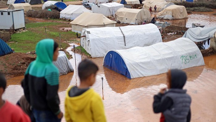 Tents are seen submerged at a camp for internally displaced persons (IDP) in the rebel-held northwestern province of Idlib on March 19, 2023. (Photo by Abdulaziz KETAZ / AFP) (Photo by ABDULAZIZ KETAZ/AFP via Getty Images)