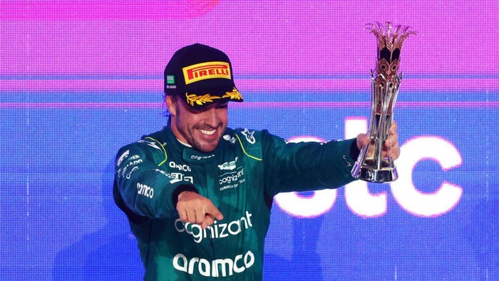 JEDDAH, SAUDI ARABIA - MARCH 19: Third placed Fernando Alonso of Spain and Aston Martin F1 Team celebrates on the podium during the F1 Grand Prix of Saudi Arabia at Jeddah Corniche Circuit on March 19, 2023 in Jeddah, Saudi Arabia. (Photo by Bryn Lennon - Formula 1/Formula 1 via Getty Images)